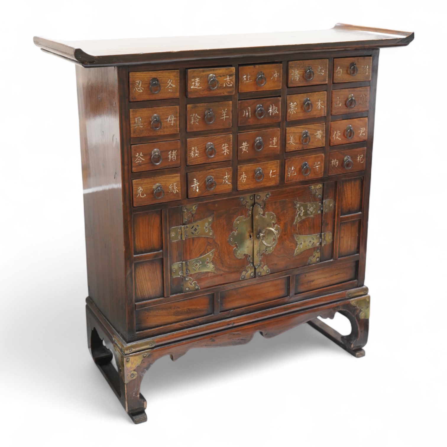 A Korean brass mounted chest with fitted drawers, decorated with calligraphy, 64cm high